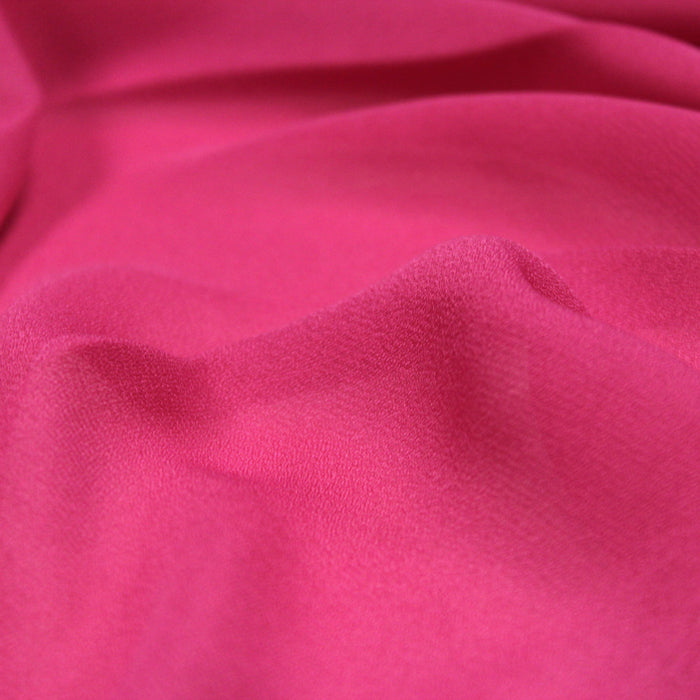 Tissu crêpe de polyester rose cyclamen uni - léger 100gr-m2