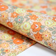 Tissu popeline coton fleurie orange jaune vert fond orange - OEKO - TEX - TissusPapi.com
