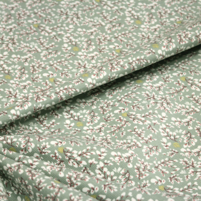 Tissu velours milleraies vert sauge aux fines fleurs blanches - OEKO-TEX