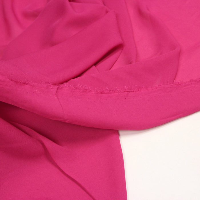 Tissu crêpe de polyester rose cyclamen uni - léger 100gr-m2