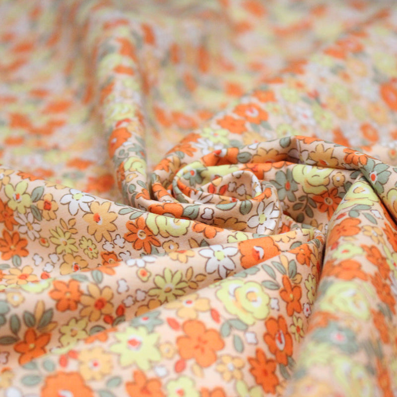 Tissu popeline coton fleurie orange jaune vert fond orange - OEKO - TEX - TissusPapi.com