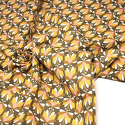 Tissu cotonnade SEVENTIES fleurs géométriques, jaune & rose fond kaki - STANDARD 100 OEKO - TEX - TissusPapi.com