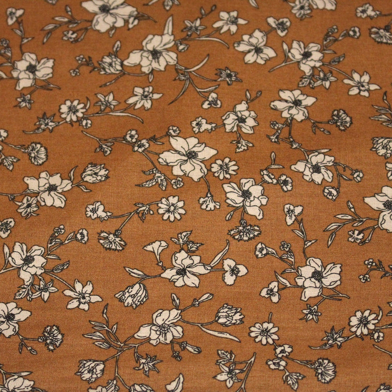Tissu popeline coton ocre aux fines fleurs écrues & noires - OEKO - TEX - TissusPapi.com