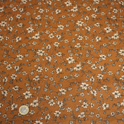 Tissu popeline coton ocre aux fines fleurs écrues & noires - OEKO - TEX - TissusPapi.com