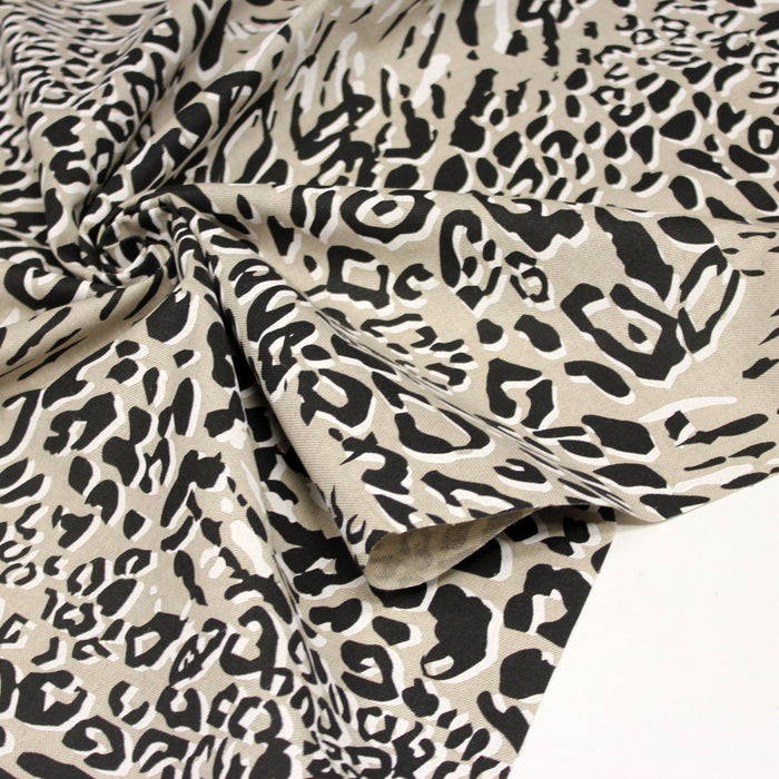 Tissu de coton demi-natté lin et motif léopard noir & blanc