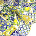 Tissu gabardine coton imprimée motif carreaux de faïence bleus et citrons jaunes - ON DESTOCKE ! - TissusPapi.com