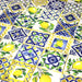 Tissu gabardine coton imprimée motif carreaux de faïence bleus et citrons jaunes - ON DESTOCKE ! - TissusPapi.com