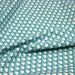 Tissu popeline coton, fleurs stylisées vert céladon et blanc - TissusPapi.com