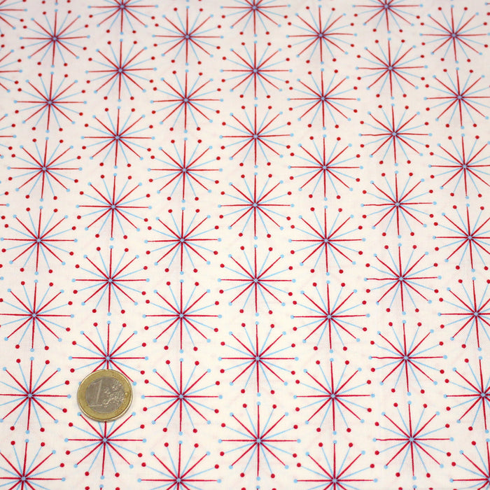 Tissu de Noël cotonnade aux étoiles bleu ciel et rouges, fond blanc