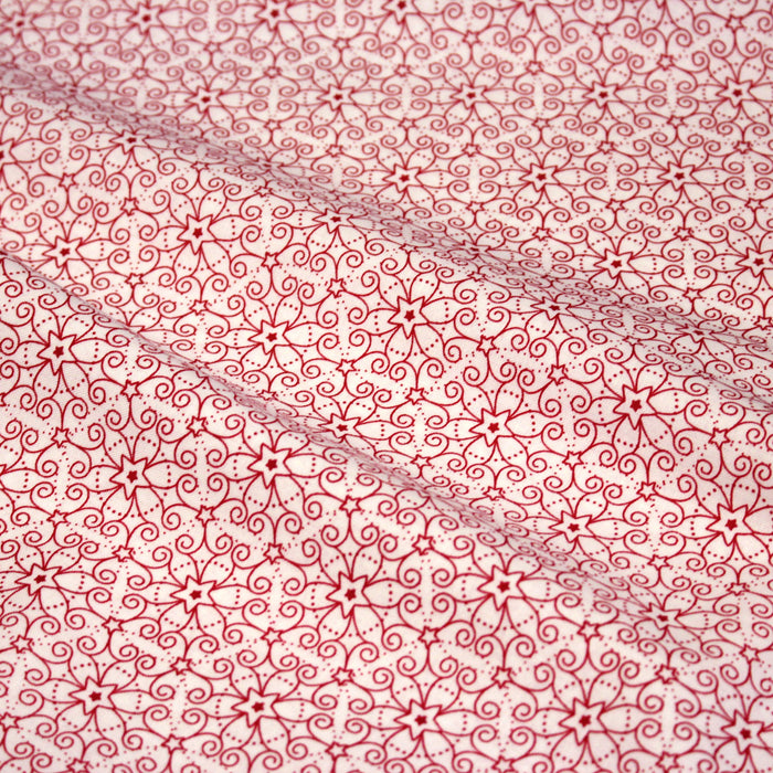 Tissu de Noël cotonnade blanc aux motifs géométriques rouges de Noël
