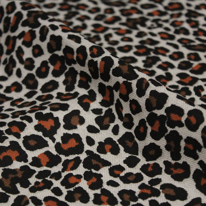 Tissu de coton demi-natté lin motif léopard noir, rouille et marron
