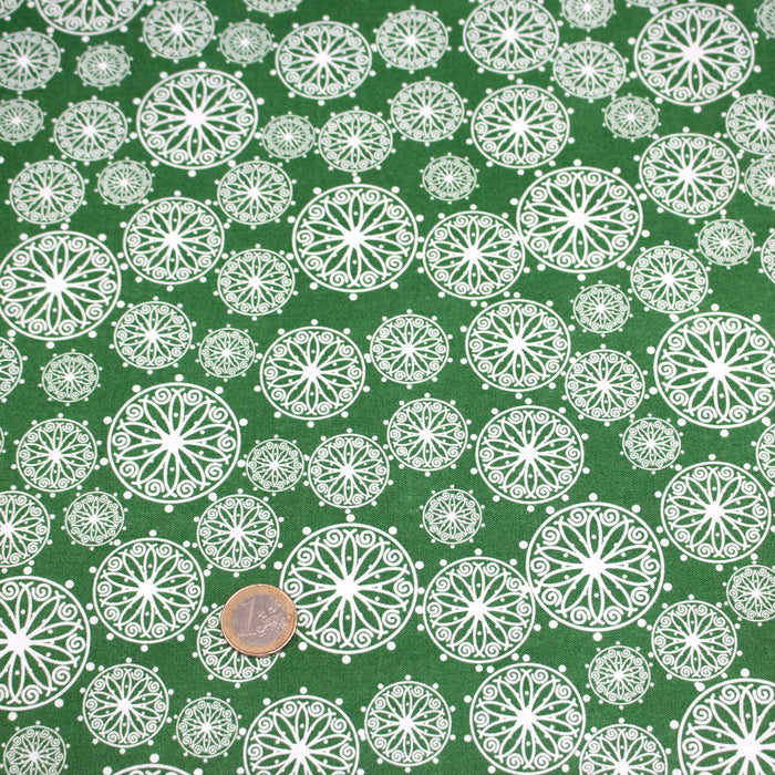 Tissu de Noël cotonnade vert aux rosaces blanches