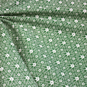 Tissu de Noël cotonnade vert aux motifs géométriques blancs de Noël - TissusPapi.com