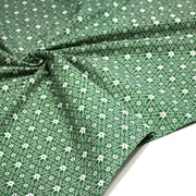 Tissu de Noël cotonnade vert aux motifs géométriques blancs de Noël - TissusPapi.com
