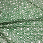 Tissu de Noël cotonnade vert aux motifs géométriques blancs de Noël - TissusPapi.com