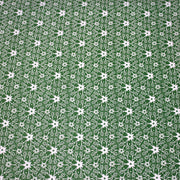 Tissu de Noël cotonnade vert aux motifs géométriques blancs de Noël - TissusPapi.com