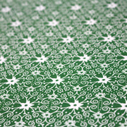 Tissu de Noël cotonnade vert aux motifs géométriques blancs de Noël - TissusPapi.com