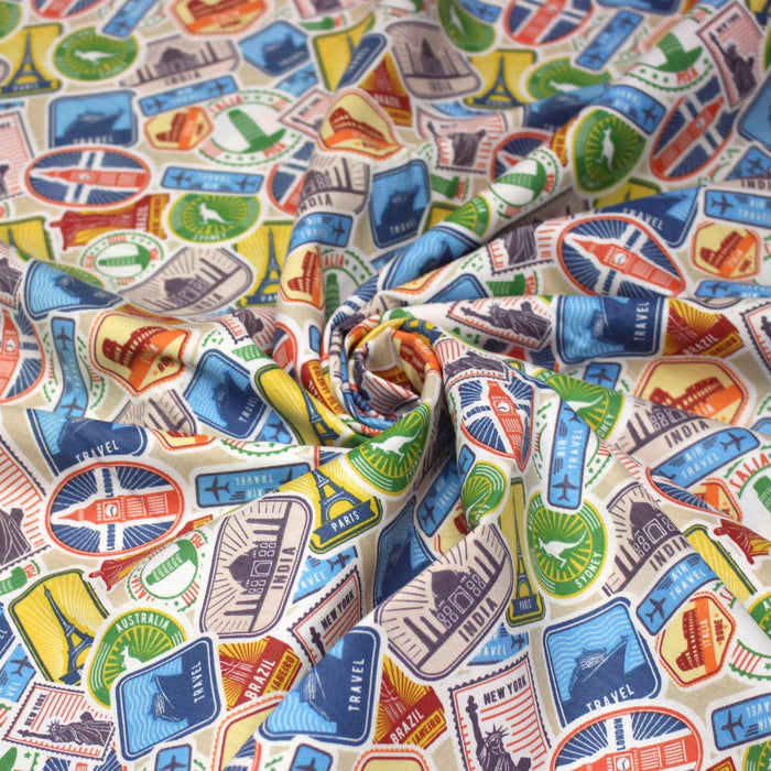 Tissu popeline coton, les autocollants de voyages, tons multicolores - Collection VOYAGE - TissusPapi.com
