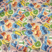 Tissu popeline coton, les autocollants de voyages, tons multicolores - Collection VOYAGE - TissusPapi.com