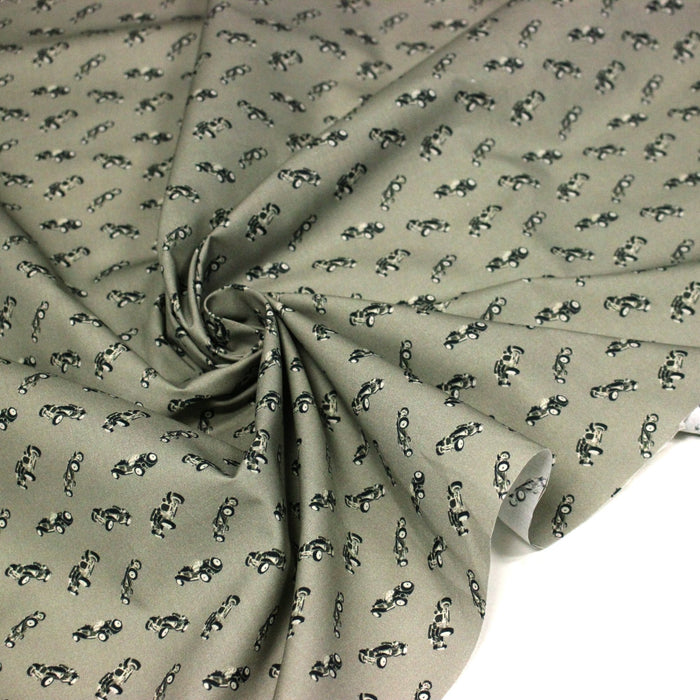 Tissu popeline coton aux petites voitures ancienne, fond vert kaki - TissusPapi.com