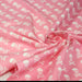 Tissu popeline coton enfant, les têtes de pirate blanc, fond rose - TissusPapi.com