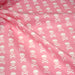 Tissu popeline coton enfant, les têtes de pirate blanc, fond rose - TissusPapi.com