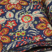 Tissu coton fin imprimé INDIENNES, fleuri rouge jaune écru, fond bleu – STANDARD 100 OEKO - TEX - TissusPapi.com