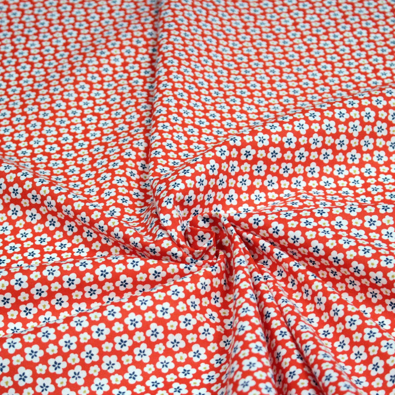 Tissu cotonnade fleurs japonaises géométriques : bleu, jaune, vert, rouge - OEKO - TEX - TissusPapi.com