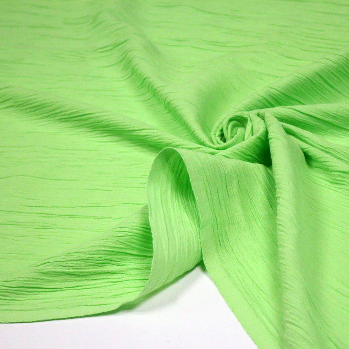 Tissu coton plissé vert pistache