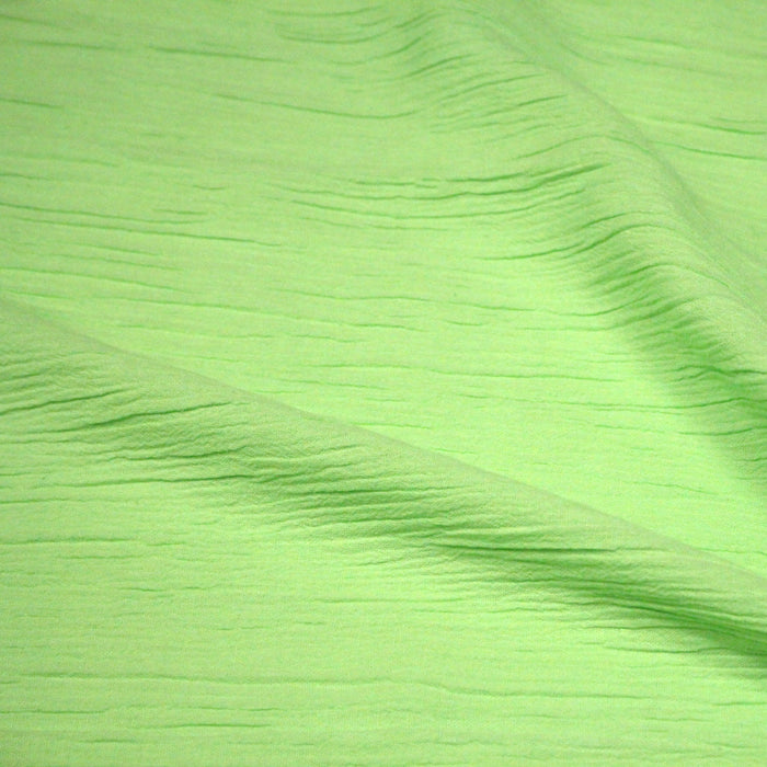 Tissu coton plissé vert pistache