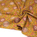 Tissu coton fin imprimé INDIENNES, jaune safran, rosaces rouges et écrues – STANDARD 100 OEKO - TEX - TissusPapi.com