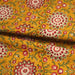 Tissu coton fin imprimé INDIENNES, jaune safran, rosaces rouges et écrues – STANDARD 100 OEKO - TEX - TissusPapi.com