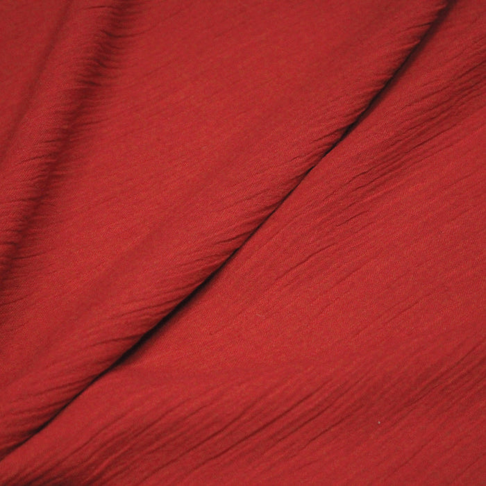 Tissu coton plissé rouge