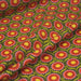 Tissu cotonnade aux fleurs SEVENTIES roses jaunes et rouges, fond kaki - OEKO-TEX STANDARD 100 - TissusPapi.com