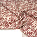 Tissu cotonnade motif japonais HANA aux fleurs de cerisier, tons écrus et rouges - TissusPapi.com