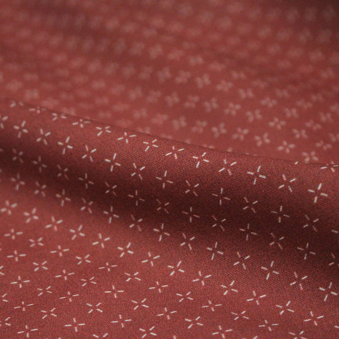 Tissu cotonnade motif japonais KA - KASURI, aux fines croix écrues, fond rouge - TissusPapi.com