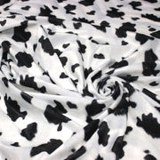 Tissu Velours imprimé motif VACHE noir et blanc - TissusPapi.com