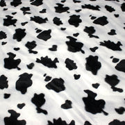 Tissu Velours imprimé motif VACHE noir et blanc - TissusPapi.com