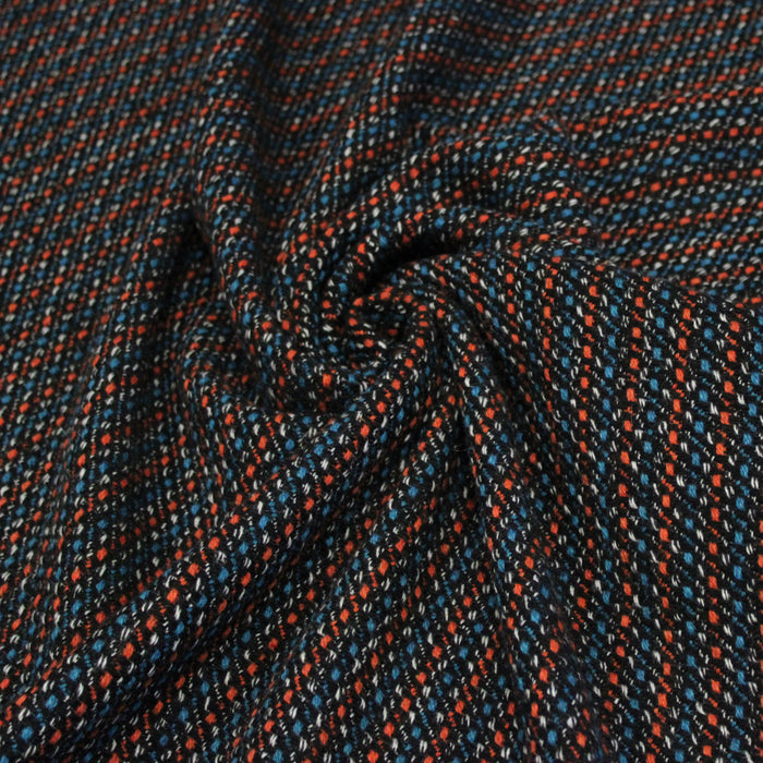 Tissu lainage faux-uni aux touches noires, corail, bleues, blanches - Fabrication italienne