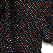 Tissu lainage faux-uni aux touches noires, corail, bleues, blanches - Fabrication italienne - TissusPapi.com