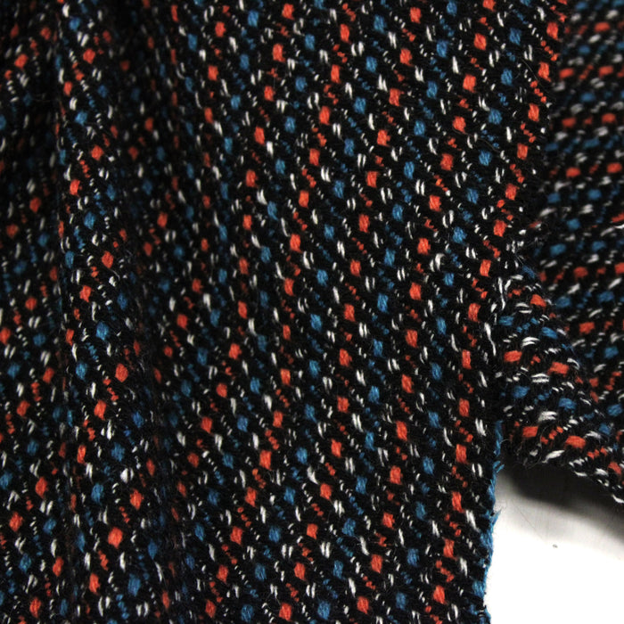 Tissu lainage faux-uni aux touches noires, corail, bleues, blanches - Fabrication italienne