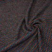 Tissu lainage faux-uni aux touches noires, corail, bleues, blanches - Fabrication italienne - TissusPapi.com