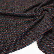 Tissu lainage faux-uni aux touches noires, corail, bleues, blanches - Fabrication italienne - TissusPapi.com