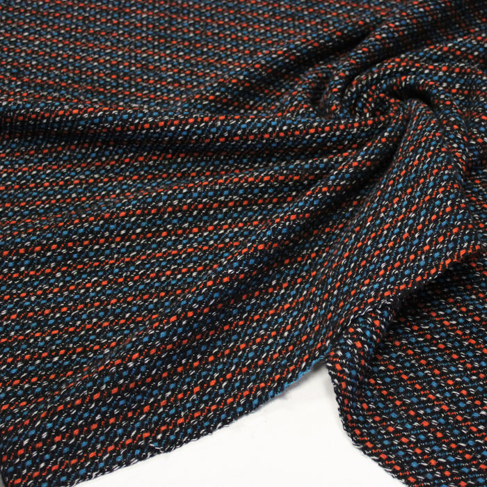 Tissu lainage faux-uni aux touches noires, corail, bleues, blanches - Fabrication italienne