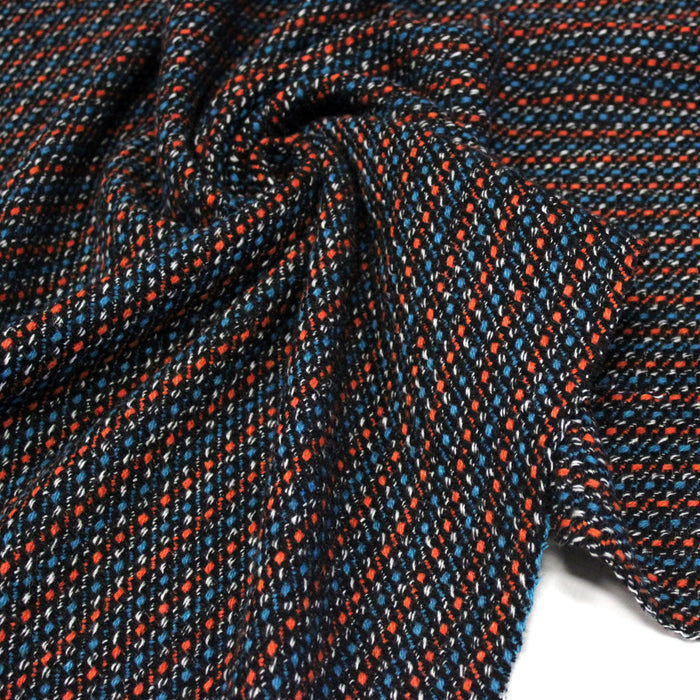 Tissu lainage faux-uni aux touches noires, corail, bleues, blanches - Fabrication italienne