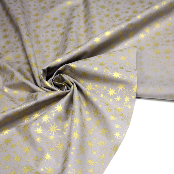 Tissu coton Noël, gris aux étoiles dorées - TissusPapi.com