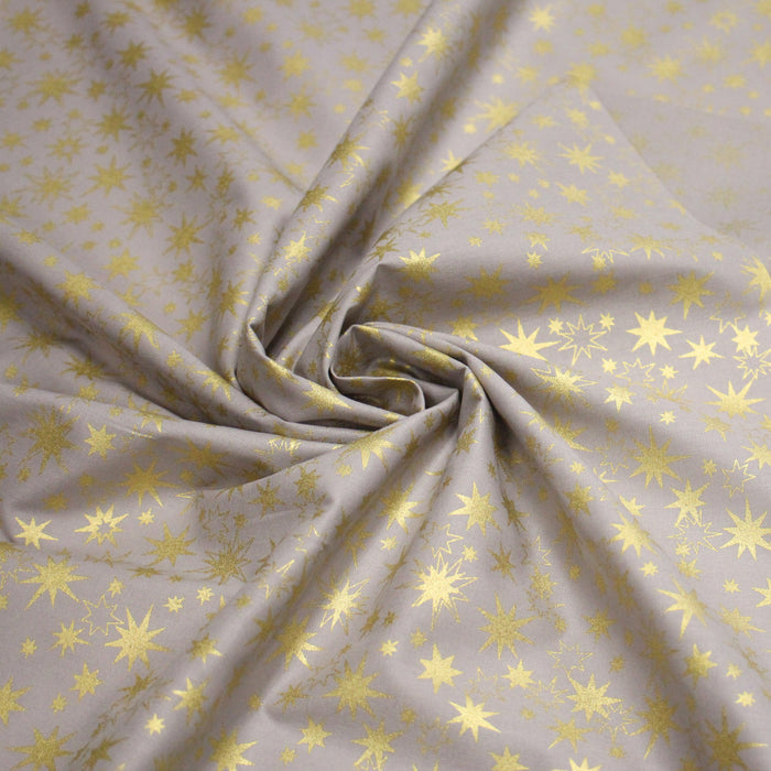 Tissu coton Noël, gris aux étoiles dorées - TissusPapi.com