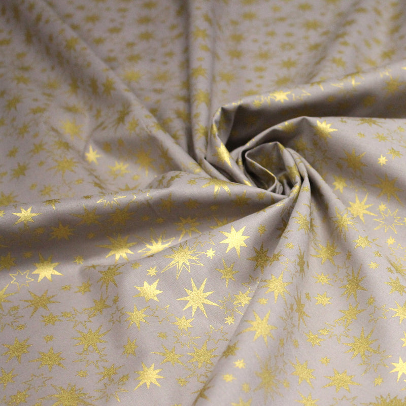 Tissu coton Noël, gris aux étoiles dorées - TissusPapi.com