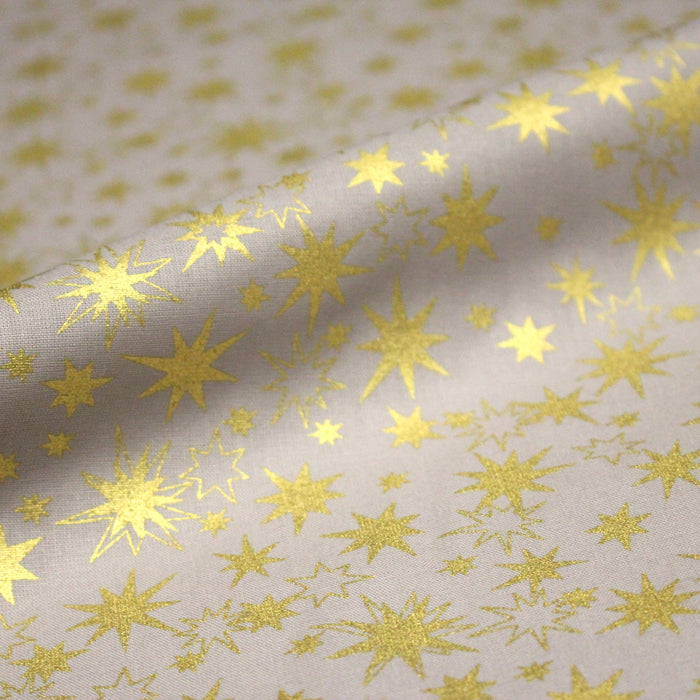 Tissu coton Noël, gris aux étoiles dorées - TissusPapi.com
