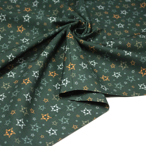 Tissu cotonnade vert aux notes de musique en étoiles - STANDARD 100 OEKO - TEX - TissusPapi.com